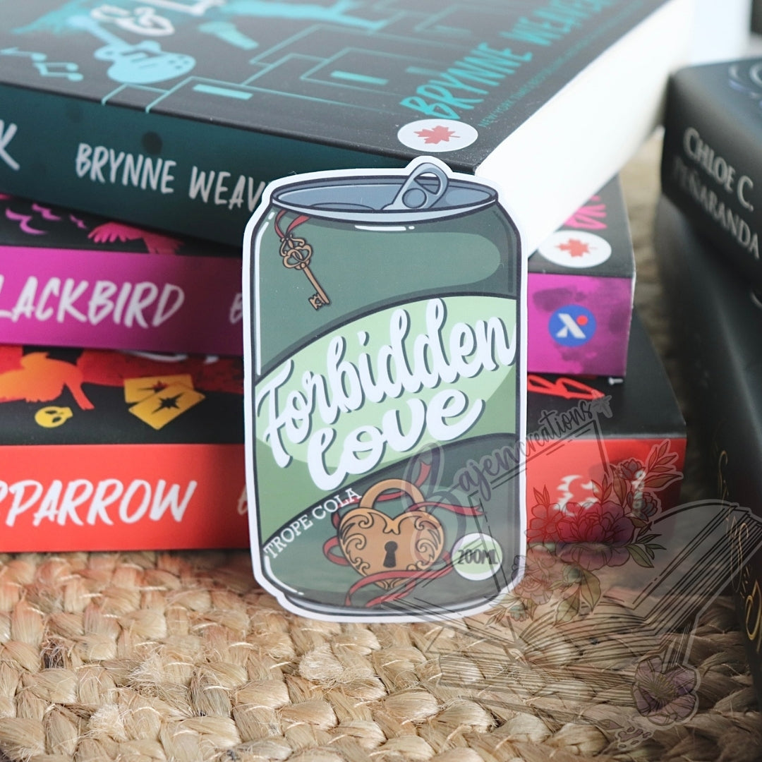 Green Sticker of a can labeled 'Forbidden Love' on a textured surface with books in the background.