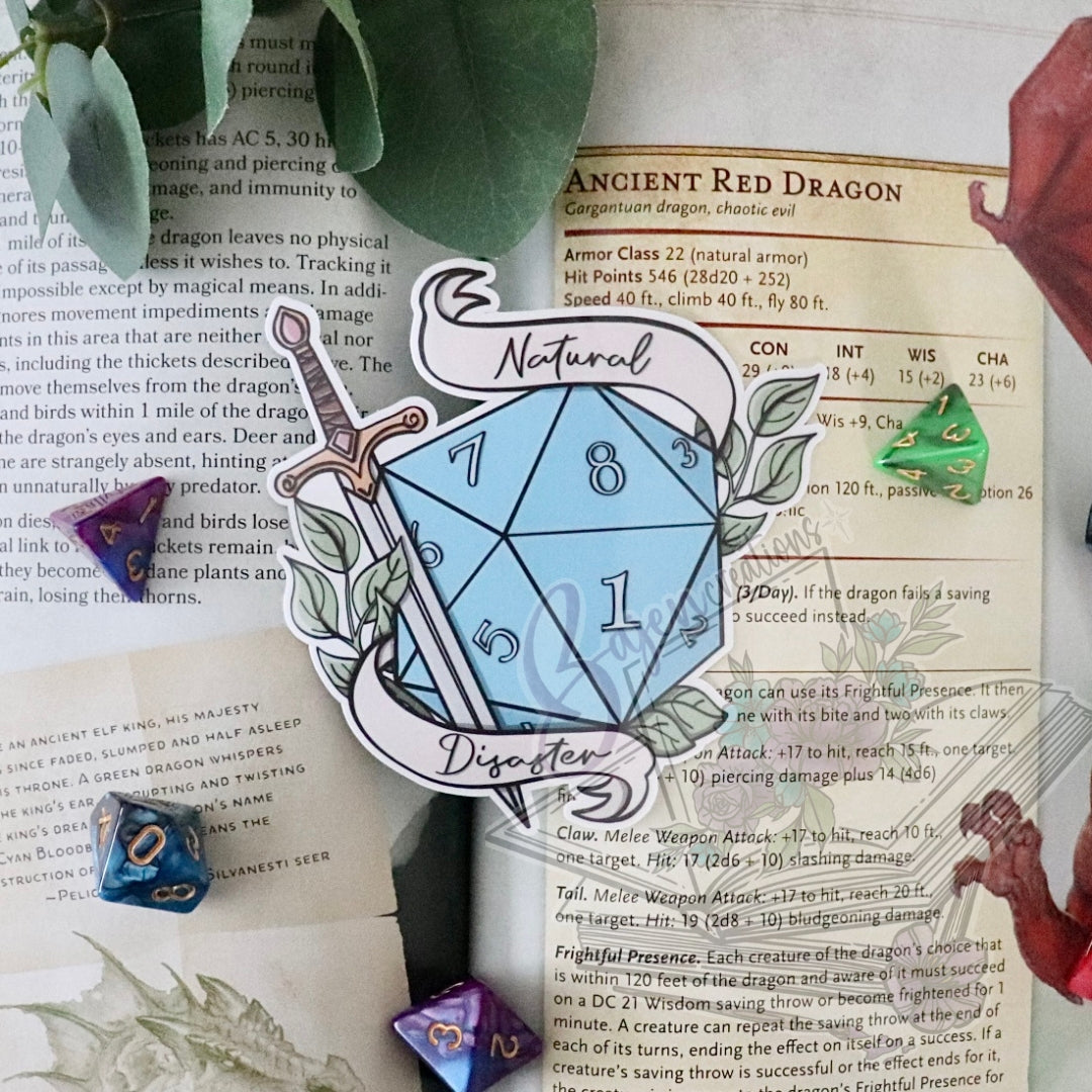 D20 die with blue face on a book page with game rules and illustrations