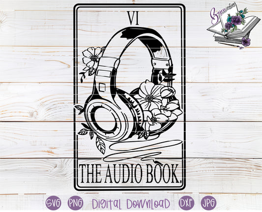 Headphones with floral designs and 'The Audio Book' text on a wooden background